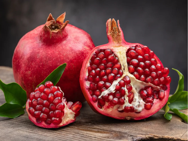 Pomegranate is a bright, ruby-red fruit filled with juicy arils that burst with sweet-tart flavor. It is rich in antioxidants and nutrients, which makes it popular for its refreshing taste and health benefits.